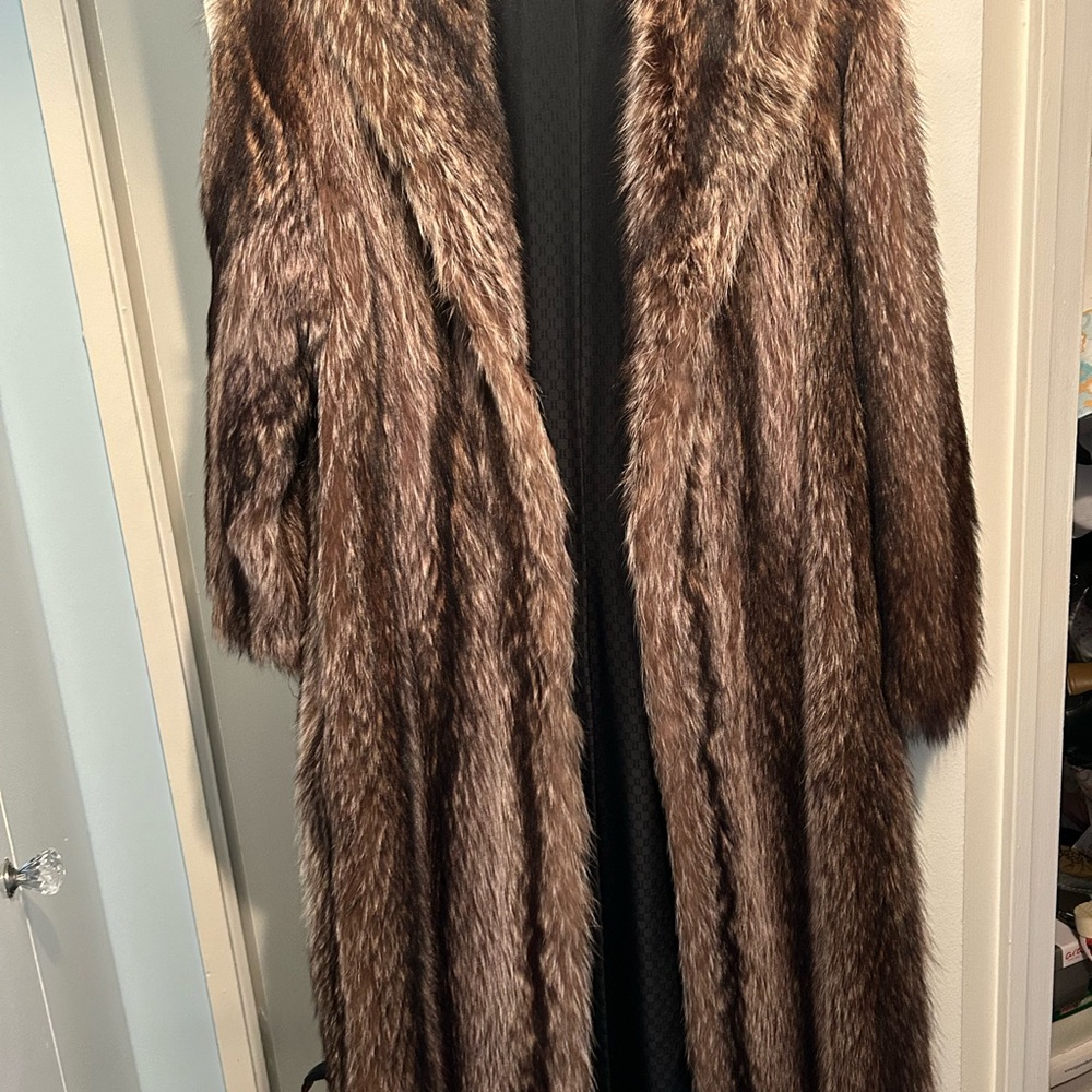 Luxurious full length raccoon fur coat.